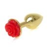 Plug dourado metálico com rosa em vermelho